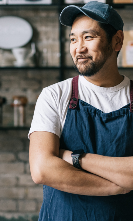 Small business owner smiling