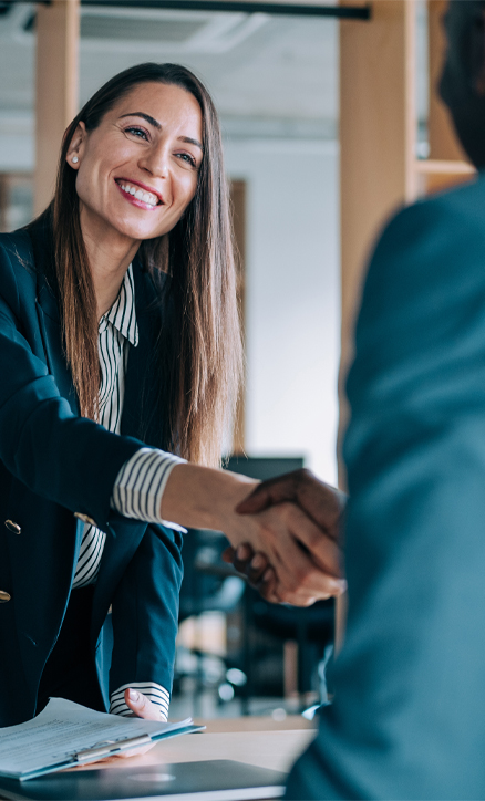 Business professionals shaking hands