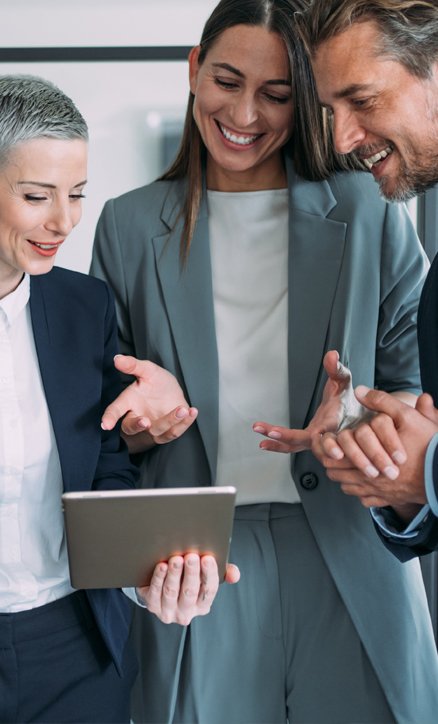 Business people viewing a tablet