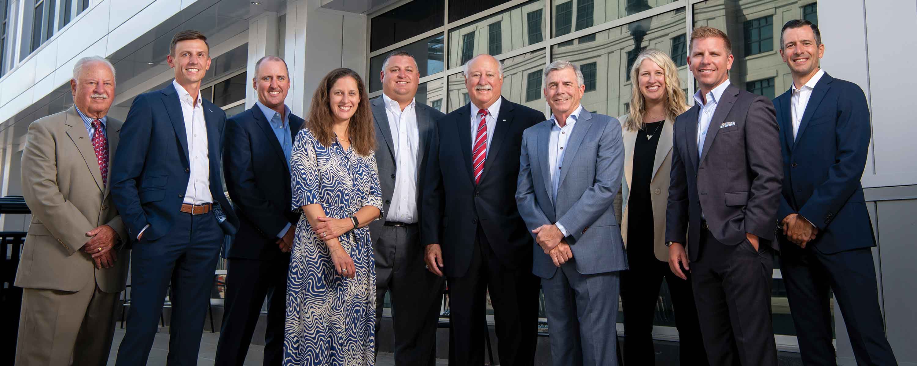 a group of people in front of a building